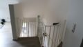 Wendeltreppe zum Wohnzimmer
